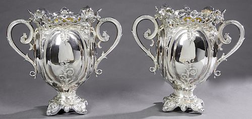 Pair of Elaborate English Silver Plate Wine Coolers, c. 1881, the pierced scalloped rim with relief female busts, over a baluster body with applied ha