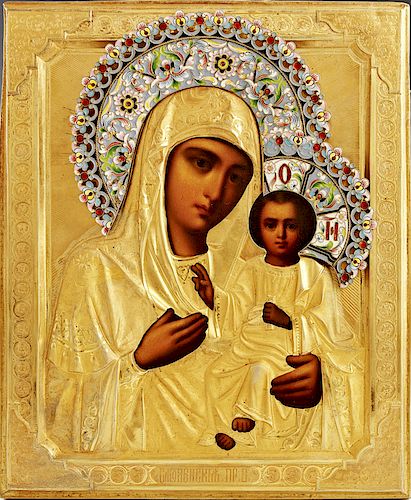 Russian Icon of the Virgin of Smolenskaya, Moscow, 1896-1908, with a gilt silver enamel oklad with a maker's mark for Kouznetsov Emelian Alexeivitch, 
