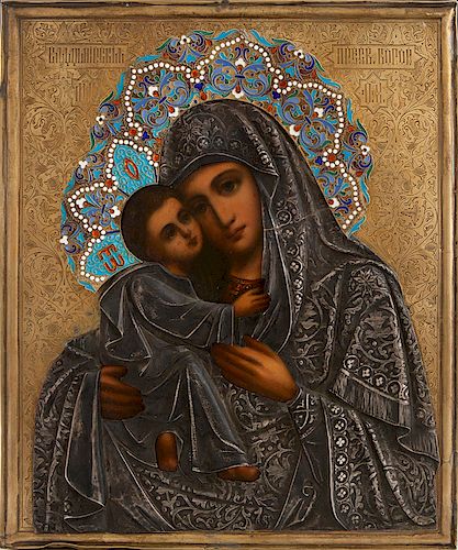 Russian Icon of the Virgin of Vladimir, Moscow, 1908-1917, with a gilt silver and enamel oklad with a maker's mark of Sbitnev Grigori Mikh, H.- 10 3/8