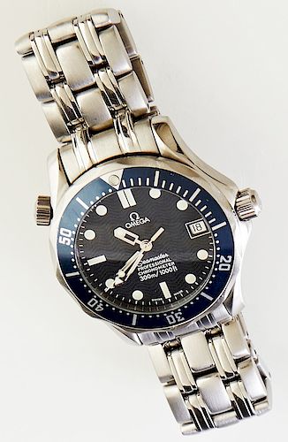 Omega Seamaster Professional 300 M "Bond" Stainless Steel Automatic Wristwatch, with a black face with date window and a blue bezel, and original Omeg