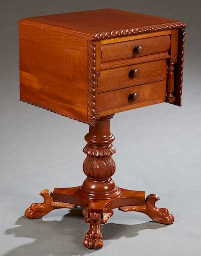 American Carved Mahogany Demilune Work Table, early 20th c., the gadrooned edge top on a tapered acanthus carved support to a quadruped base on paw fe
