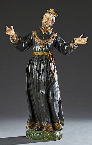 Large Carved Wooden Santo, 19th c., of a bearded robed man with a crown and outstretched arms, on an integral base, with gilt and black paint decorati