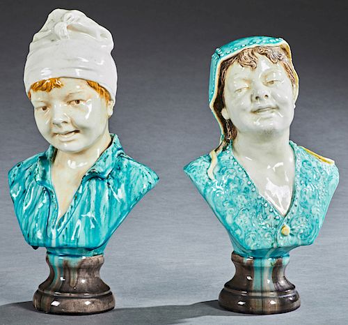 George Jones (1823-1893, English), "Peasant Boy," and "Peasant Girl," 19th c., pair of Majolica busts, impressed "222," and "GJ" on the integral stand