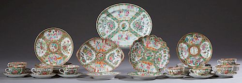 Thirty Piece Chinese Rose Medallion Partial Tea Set, 19th c., consisting of 9 luncheon plates, 4 cups, 12 saucers, 4 cake plates and a footed scallope