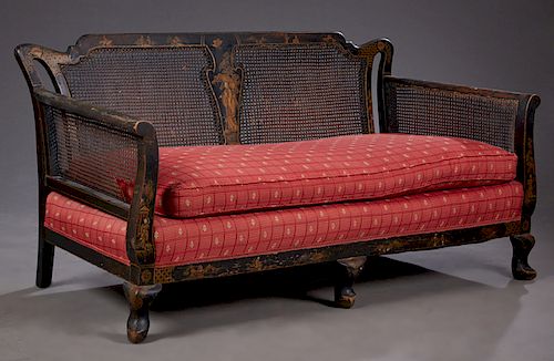Black Lacquer Caned Queen Anne Style Settee, early 20th c., with gilt chinoiserie figural and landscape decoration on the caned back, scrolled arms, a