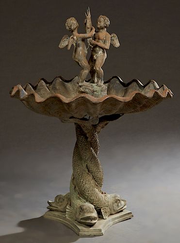 Patinated Bronze Fountain, 20th c., with two winged putti holding a swordfish, in the center of a large circular shell, on a tripodal entwined dolphin