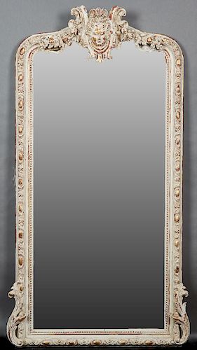 Large Classical Style Gilt and Polychromed Overmantle Mirror, late 19th c., the arched crown with a central relief masque of Medusa, flanked by scroll
