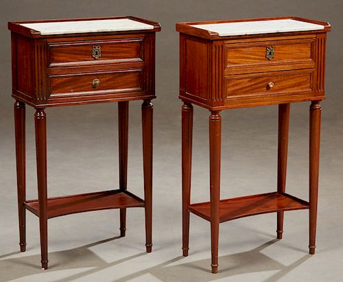 Pair of French Carved Mahogany Louis XVI Style Marble Top Nightstands, early 20th c., the 3/4 galleried tops with an inset figured white marble over t