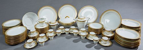 Sixty-Two Piece Charles Field Haviland Porcelain Limoges Dessert Service, early 20th c., with gilt rims and gilt tracery borders, consisting of 17 cof