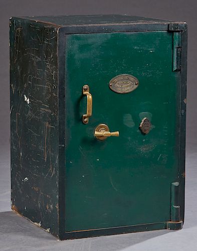 English Victorian Cast Iron Safe, late 19th c., with a brass locking lever and handle, and a brass plaque for "Thomas Withers & Sons, West Bromwich, E