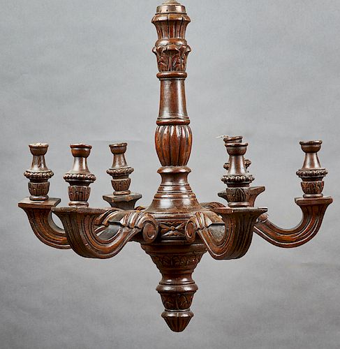 French Carved Walnut Louis XV Style Six Light Chandelier, 20th c., the stepped reeded support to a central ring issuing six scrolled square arms with 