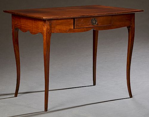 French Louis XV Style Carved Mahogany Diminutive Writing Table, 19th c., the rectangular top over a wide serpentine skirt with a single frieze drawer,