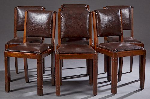 Set of Seven French Art Deco Carved Mahogany Dining Chairs, c. 1940, the leather upholstered slip seat chairs on incised rounded legs, H.- 33 1/2 in.,