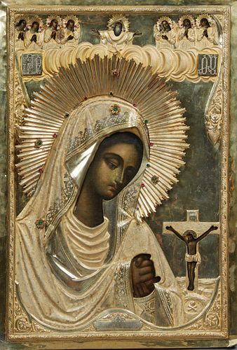 Russian Icon of the Virgin Akhtirskaya, Moscow, 1896-1908, the gilt silver oklad mounted with seed pearls and semi-precious jewels, with the mark of I