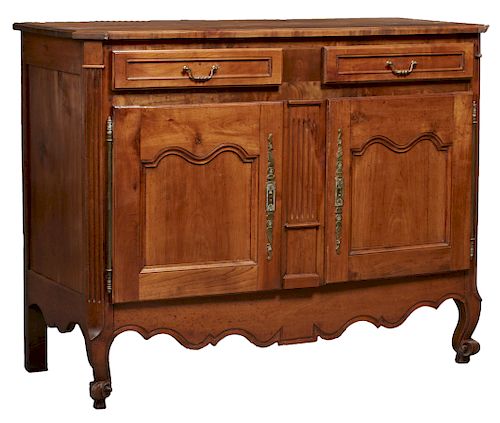 French Louis XV Style Carved Cherry Buffet a Deux Corps, 19th c., the arched stepped canted corner crown over double arched cupboard doors with brass 