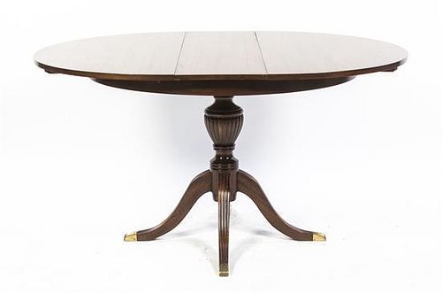 A Regency Style Mahogany Extension Table, Height 30 x diameter 43 1/4 inches.