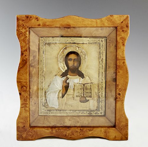 Russian Icon of Christ Pantocrator, Moscow, 1908-1917, with a gilt silver oklad by Kouznetsov Emelian Alexeivitch, presented in a burled wood kiot, H.