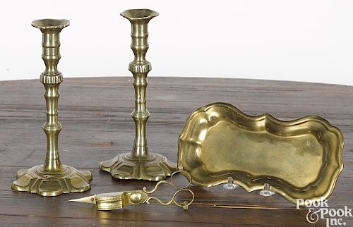 Pair of Georgian brass pedal base candlesticks
