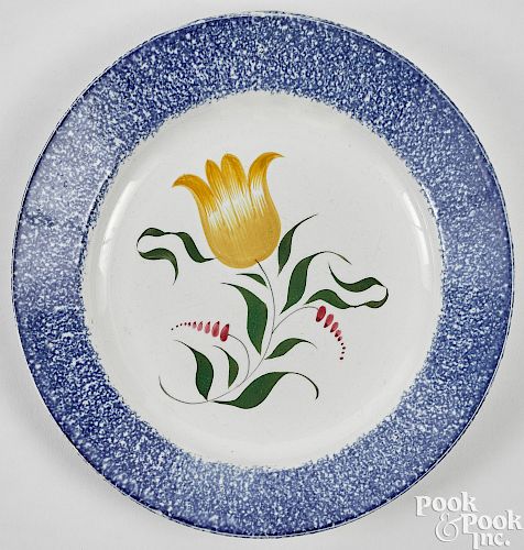 Blue spatter plate with yellow tulip