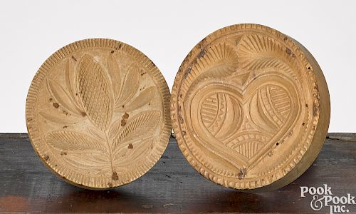 Two Pennsylvania carved and turned butter prints