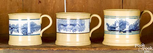 Three yellowware mocha mugs