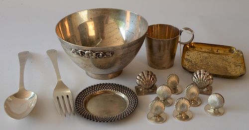 Tiffany & Co. sterling silver lot including fork, spoon, bowl, cup, shell place card holders, and two small trays. 
18.8 troy ounces...