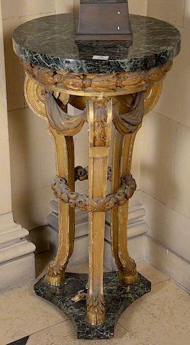 Pair of baroque style gilt stands having round marble tops over conforming top on three legs, supports ending in hoof feet set on ma...