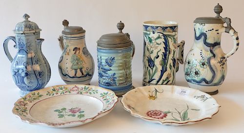 Seven piece Faience lot to include three steins, pitcher, two plates, and mug. 
***If this lot is not picked up on Sat. 9/22, Sun. 9...