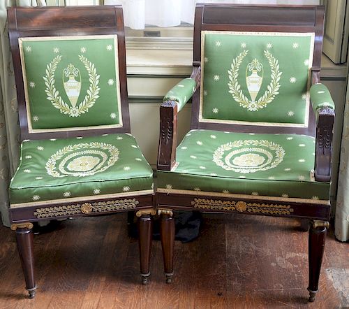 Set of thirteen French empire style mahogany dining chairs with gilt bronze mounts, one with arms (five are frame only / no upholste...