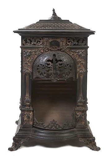 A Victorian Style Wrought Iron Stove, Height 37 x width 24 1/4 x depth 23 inches.