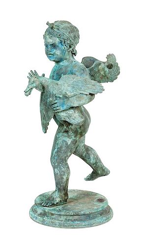 A Bronze Figural Group of A Putto and Goose Height 23 1/2 inches.