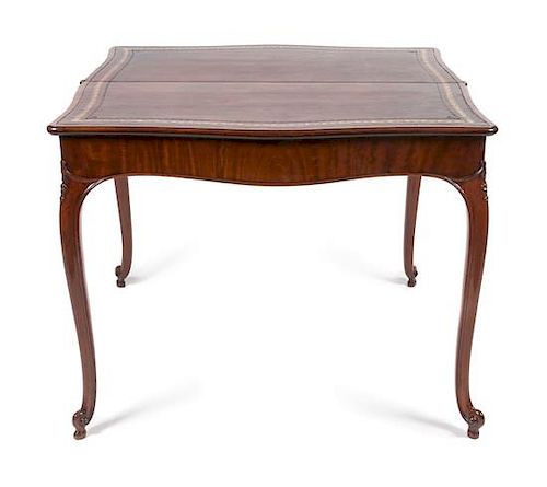 A George III Mahogany Games Table Height 29 x width 35 3/5 x depth 17 1/2 inches.