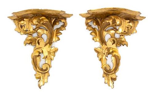 A Pair of Italian Rococo Style Carved and Gilt Painted Wall Brackets Height 9 3/4 inches.