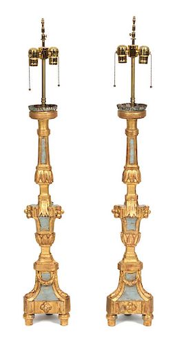 A Pair of Italian Rococo Style Painted and Parcel Gilt Prickets Height 30 inches.