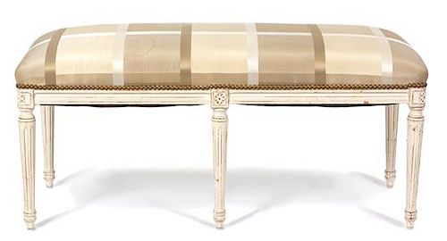 A Louis XVI Style Painted and Upholstered Bench Height 20 x width 41 x depth 17 inches.
