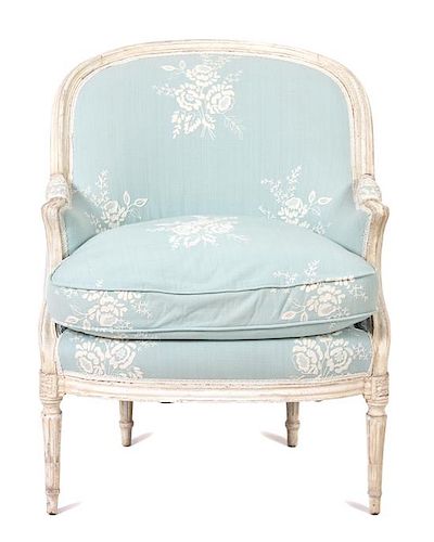 A Louis XVI Style Carved and Painted Bergere Height 37 inches.