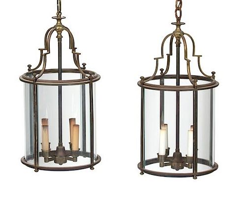 A Pair of French Brass and Glass Circular Hall Lanterns Height 21 x diameter 11 inches.