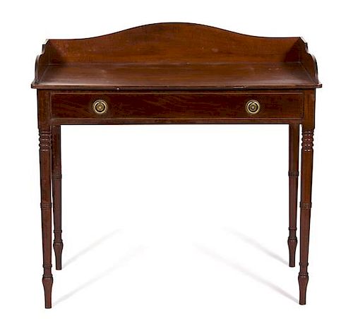 A Regency Mahogany Side Table Height 37 1/2 x width 39 x depth 21 3/4 inches.