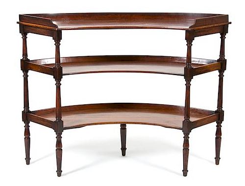 A Regency Style Mahogany Three-Tier Curved Serving Board Height 40 1/2 x width 53 x depth 19 1/2 inches.