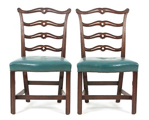 A Pair of Chippendale Style Carved Mahogany Ladder Back Side Chairs Height 37 1/2 inches.