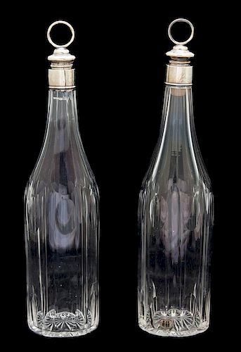A Pair of English Silver Mounted Cut Glass Bottles Height 12 3/4 inches.