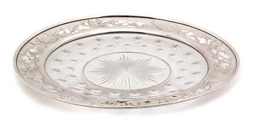 * An American Silver Rimmed Cut Glass Dish, 20th Century, having star burst design