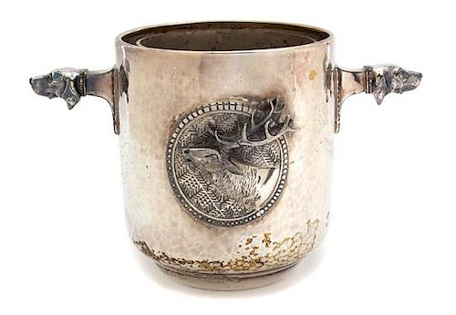 A Silver Plate Hand Hammered Ice Bucket with Hound's Head Handles Height 8 1/4 inches.