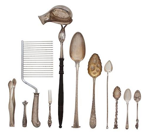 A Miscellaneous Group of Silver Serving Items, Various Makers, including a ladle, a serving spoon, a berry spoon, a cake rake, 6