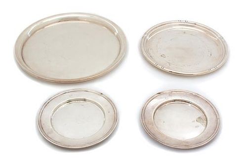 Four American Silver Articles, Various Makers, comprising a pair of small plates, a salver, and a serving tray