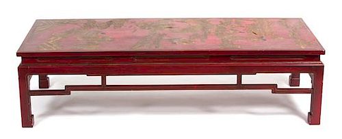 A Chinese Red and Gold Lacquered Low Table Height 15 1/2 x width 59 x depth 23 1/2 inches