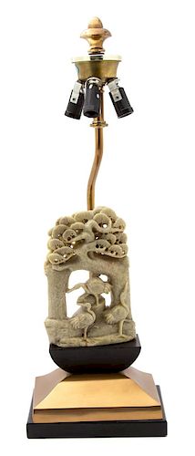 A Chinese Carved Soapstone Sculpture Mounted as a Lamp Height of soapstone 6 1/2 inches, lamp 19 inches.