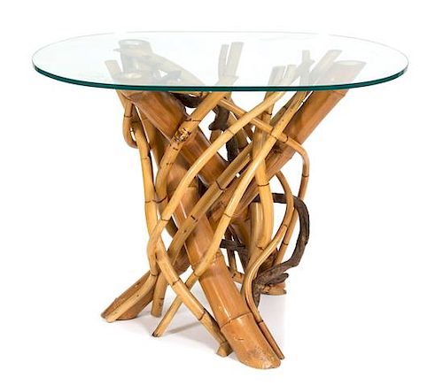 A Twisted Bamboo Glass Top Table Height 30 x width 38 x depth 26 3/4 inches.