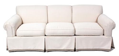 A Contemporary Upholstered Three-Seat Sofa Height 32 x length 83 inches.