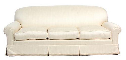A Contemporary Upholstered Three-Cushion Sofa Height 37 x length 87 inches.